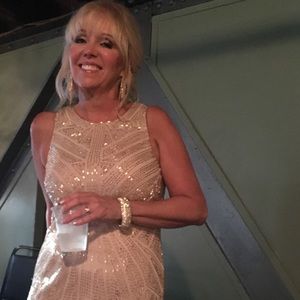 Champagne color long evening gown.